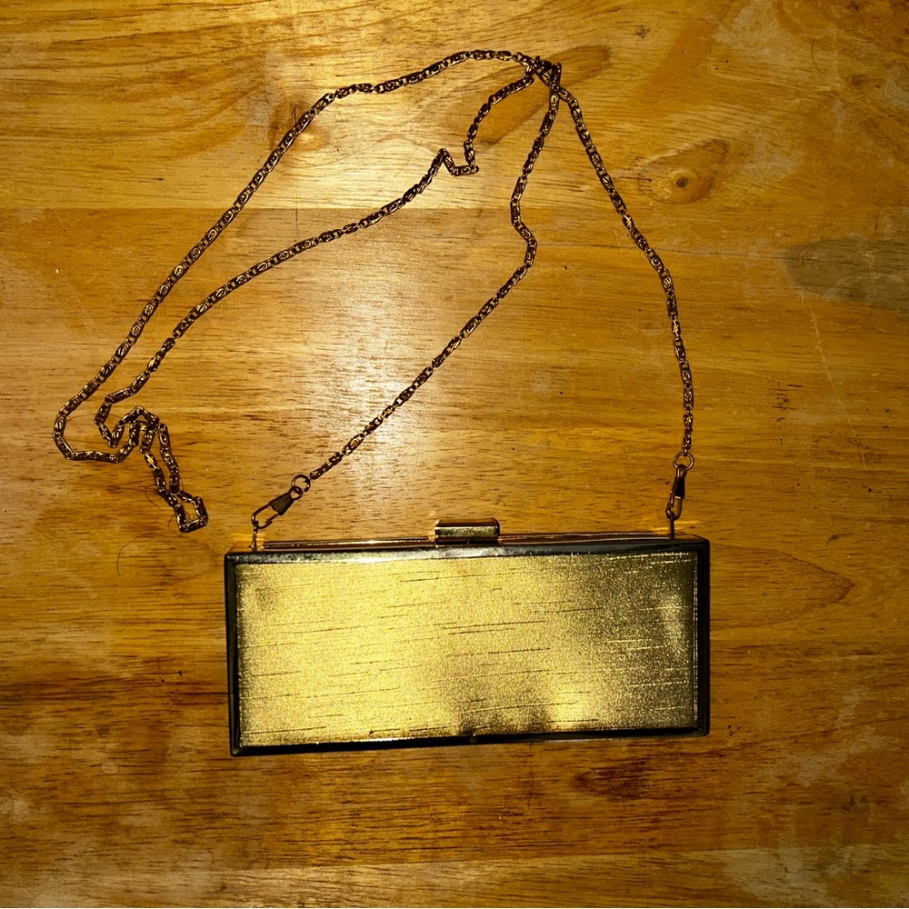 Gold clutch with cross body addition that can be added or taken off